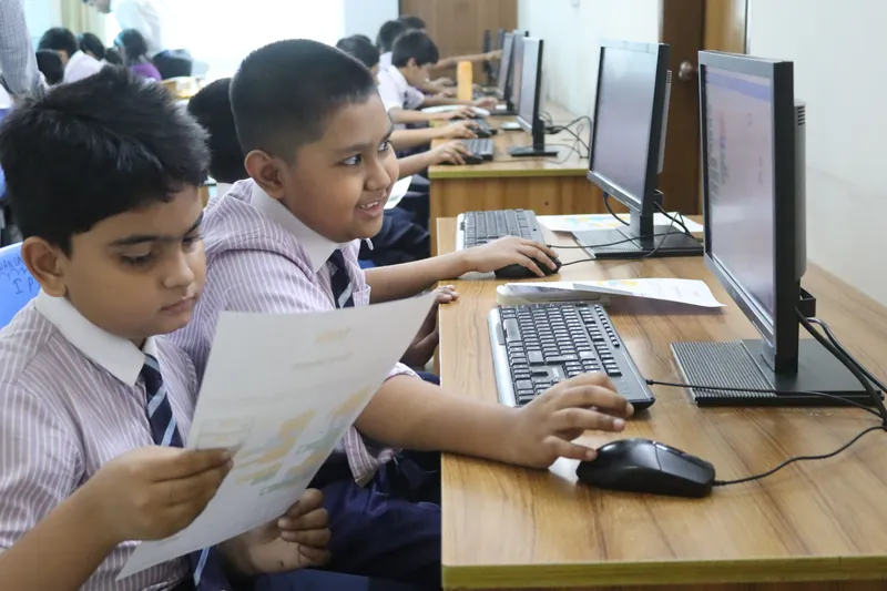 Children solving a hands-on classroom activity together